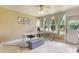 Bright office space with large windows, neutral walls, and tile floors at 8932 Village Green Blvd, Clermont, FL 34711