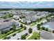 This is an aerial view of the neighborhood showcasing the lush landscaping and well-maintained homes at 9201 Smithies St, Orlando, FL 32827