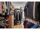 Walk-in closet featuring custom shelving for maximum storage and organization at 9201 Smithies St, Orlando, FL 32827