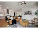 The open-concept living area seamlessly connects to the kitchen, providing a fluid and inviting space for relaxation at 9201 Smithies St, Orlando, FL 32827