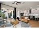 The living room merges indoor-outdoor living with a large sliding glass door to enjoy the outdoor patio at 9201 Smithies St, Orlando, FL 32827