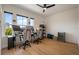 Bright office space with natural light, featuring desk setups for two, perfect for a productive work environment at 9201 Smithies St, Orlando, FL 32827