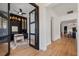 A home office featuring custom built-ins and modern furnishings at 9201 Smithies St, Orlando, FL 32827