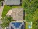 Overhead view of houses, highlighting roof details and backyard layout at 9454 Candice Ct, Orlando, FL 32832