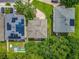 Aerial shot of rooftops with solar panels, showcasing sustainable energy features at 9454 Candice Ct, Orlando, FL 32832