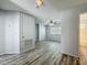 Comfortable bedroom featuring wood-look floors, a ceiling fan, and a bright window at 9454 Candice Ct, Orlando, FL 32832
