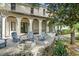 Charming backyard with a stone fire pit area, complemented by an inviting outdoor lounge and spa at 9809 Covent Garden Dr # Drive, Orlando, FL 32827
