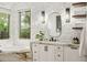 Bathroom featuring open shelving, marble countertops, and modern lighting at 9809 Covent Garden Dr # Drive, Orlando, FL 32827