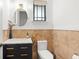 Charming powder room with travertine accents, modern fixtures, and a stylish vanity at 9809 Covent Garden Dr # Drive, Orlando, FL 32827
