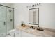 Contemporary bathroom featuring sleek fixtures, a glass shower, and ample storage at 9809 Covent Garden Dr # Drive, Orlando, FL 32827