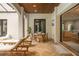Open air living space with dining and lounging areas and easy access to the living room at 9809 Covent Garden Dr # Drive, Orlando, FL 32827