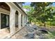 Inviting outdoor patio with a cozy fire pit, seating, and an outdoor spa for relaxation at 9809 Covent Garden Dr # Drive, Orlando, FL 32827