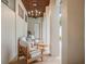 Inviting covered patio featuring a chandelier, wood ceiling, and comfortable seating area at 9809 Covent Garden Dr # Drive, Orlando, FL 32827