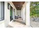 Covered patio area with comfortable seating and stylish lighting fixtures, perfect for outdoor relaxation at 9809 Covent Garden Dr # Drive, Orlando, FL 32827