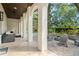 Outdoor living space featuring a covered patio, fire pit, and comfortable seating, great for entertaining at 9809 Covent Garden Dr # Drive, Orlando, FL 32827