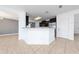 Modern kitchen with granite countertops, stainless steel appliances, and ample cabinet space at 1951 Betsy Ross Ln, St Cloud, FL 34769