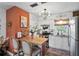Charming kitchen featuring modern lighting, stylish accents, and updated appliances at 1100 E Caroline St # 204, Tavares, FL 32778