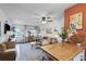 Bright living space with views, blending a cozy living room with a kitchen area at 1100 E Caroline St # 204, Tavares, FL 32778
