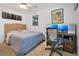Inviting bedroom with a workstation, neutral tones, and decor at 1200 Ridge Rd, Longwood, FL 32750