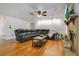 Spacious living room featuring wood floors, recessed lighting, and a contemporary fireplace at 1200 Ridge Rd, Longwood, FL 32750