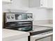 Close up of a stainless steel electric stove top at 121 W Oakland Ave, Oakland, FL 34760