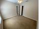 Bedroom with carpet, ceiling fan and closet at 1227 Juniper Hammock St, Winter Garden, FL 34787