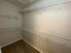 Walk-in closet featuring white wire shelving on all walls at 1227 Juniper Hammock St, Winter Garden, FL 34787