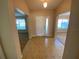Bright entryway with neutral walls and views to other rooms at 1227 Juniper Hammock St, Winter Garden, FL 34787