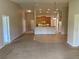 Spacious living room that opens up to the kitchen and dining area at 1227 Juniper Hammock St, Winter Garden, FL 34787