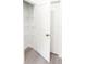Open closet with white wire shelving and bright lighting, offering ample storage space at 1309 Hillsborough Ln, Kissimmee, FL 34759