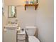 Functional bathroom with essential fixtures and storage at 1390 E Airport Blvd, Sanford, FL 32773