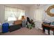 Bright bedroom with two windows and closet space at 1390 E Airport Blvd, Sanford, FL 32773