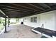 Well-maintained carport area attached to the home, providing sheltered parking at 1390 E Airport Blvd, Sanford, FL 32773