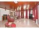 Spacious living room with hardwood ceiling, creating a cozy atmosphere at 1390 E Airport Blvd, Sanford, FL 32773