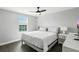Comfortable bedroom with a large window at 13924 Jomatt Loop, Winter Garden, FL 34787
