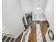Elegant two-story entryway featuring a modern chandelier and staircase at 13924 Jomatt Loop, Winter Garden, FL 34787