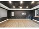 Finished Home Theater with a large screen at 13924 Jomatt Loop, Winter Garden, FL 34787