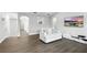 Additional sitting area with hardwood flooring at 13924 Jomatt Loop, Winter Garden, FL 34787