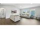 Comfortable living room with hardwood floors and plenty of natural light at 13924 Jomatt Loop, Winter Garden, FL 34787