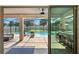 Covered patio view overlooking a sparkling pool with a screened enclosure and a bar at 13924 Jomatt Loop, Winter Garden, FL 34787