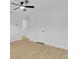 Bedroom with new vinyl floor, ceiling fan and entry to the other rooms at 1484 Lake Francis Dr, Apopka, FL 32712