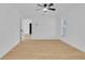 Bright bedroom featuring neutral walls, recessed lighting, ceiling fan, and wood-look flooring at 1484 Lake Francis Dr, Apopka, FL 32712