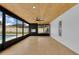 Enclosed patio with tongue and groove ceiling and outdoor views at 1484 Lake Francis Dr, Apopka, FL 32712