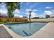 Clear in-ground pool with steps, surrounded by a concrete deck and a spacious fenced-in backyard at 1484 Lake Francis Dr, Apopka, FL 32712