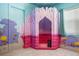 bedroom with custom built coral playhouse featuring murals and a hidden speaker at 1526 Euston Dr, Reunion, FL 34747
