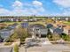 Stunning two-story home with a manicured lawn and picturesque views of the surrounding neighborhood at 1526 Euston Dr, Reunion, FL 34747