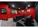 Home theater room with reclining seats, star lighting, and an oversized movie screen at 1526 Euston Dr, Reunion, FL 34747
