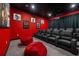 Home theater room with reclining seats, star lighting, and an oversized movie screen at 1526 Euston Dr, Reunion, FL 34747