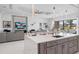 Open kitchen island featuring a stylish island, recessed lighting, and seamless connectivity to the cozy living area at 1526 Euston Dr, Reunion, FL 34747