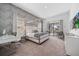 Expansive main bedroom with a modern four poster bed, luxurious carpet, and elegant décor at 1526 Euston Dr, Reunion, FL 34747